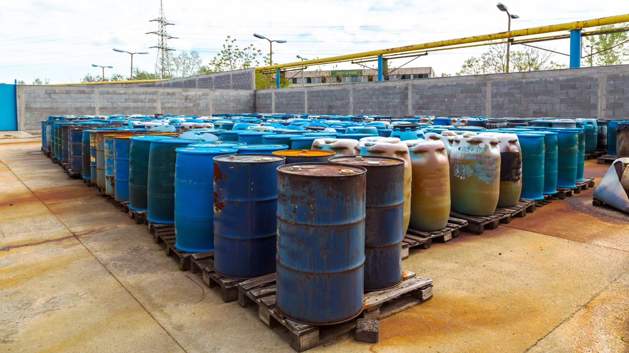 Drums and other containers of hazardous waste being readied for hazardous waste disposal.